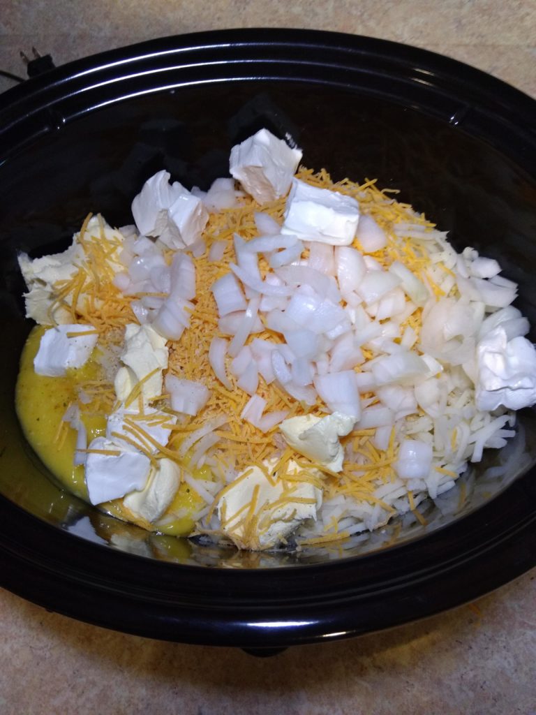 cheesy hash brown casserole before mixing together